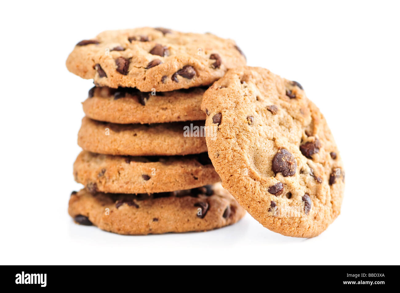 Tall stack of chocolate chip cookies isolated on white background Stock Photo