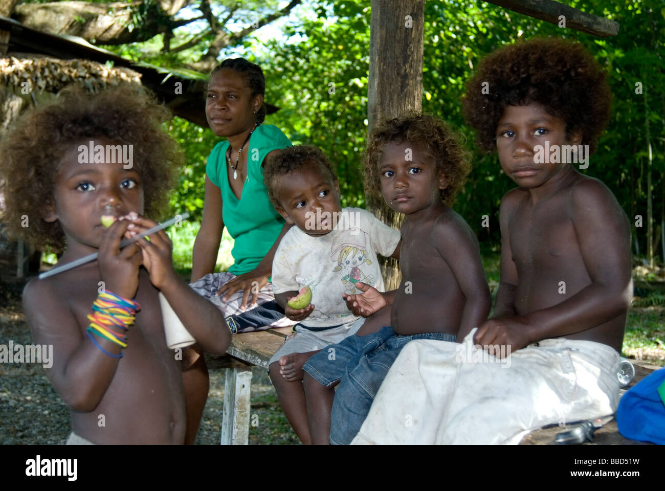 Women and children in rural Guadalcanal , Solomon Islands Stock Photo