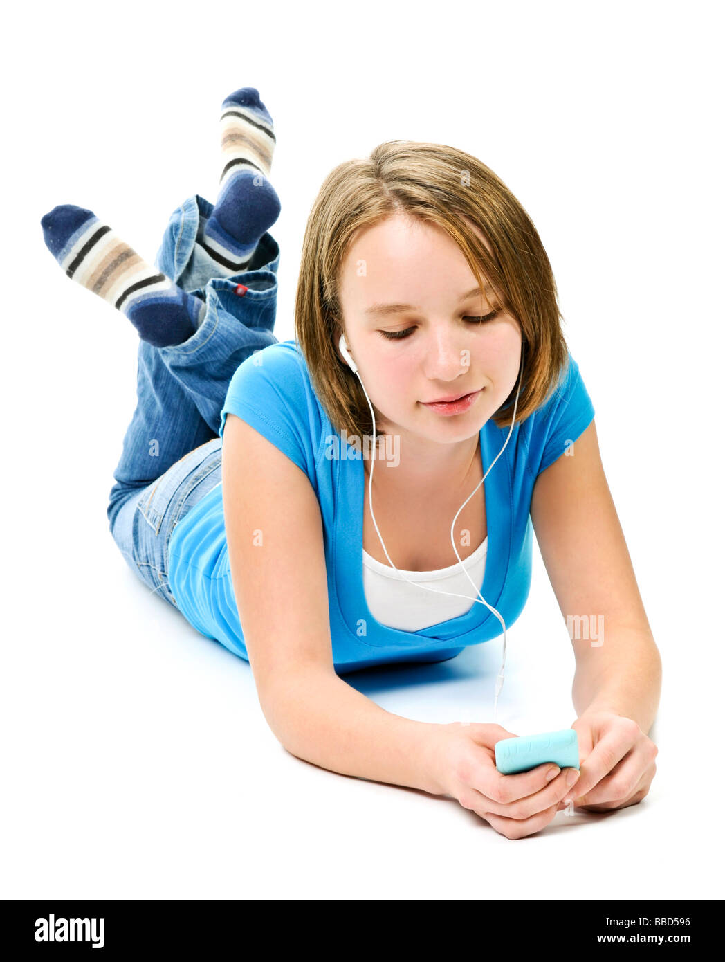 Teenage girl listening to music with her mp3 player Stock Photo Alamy