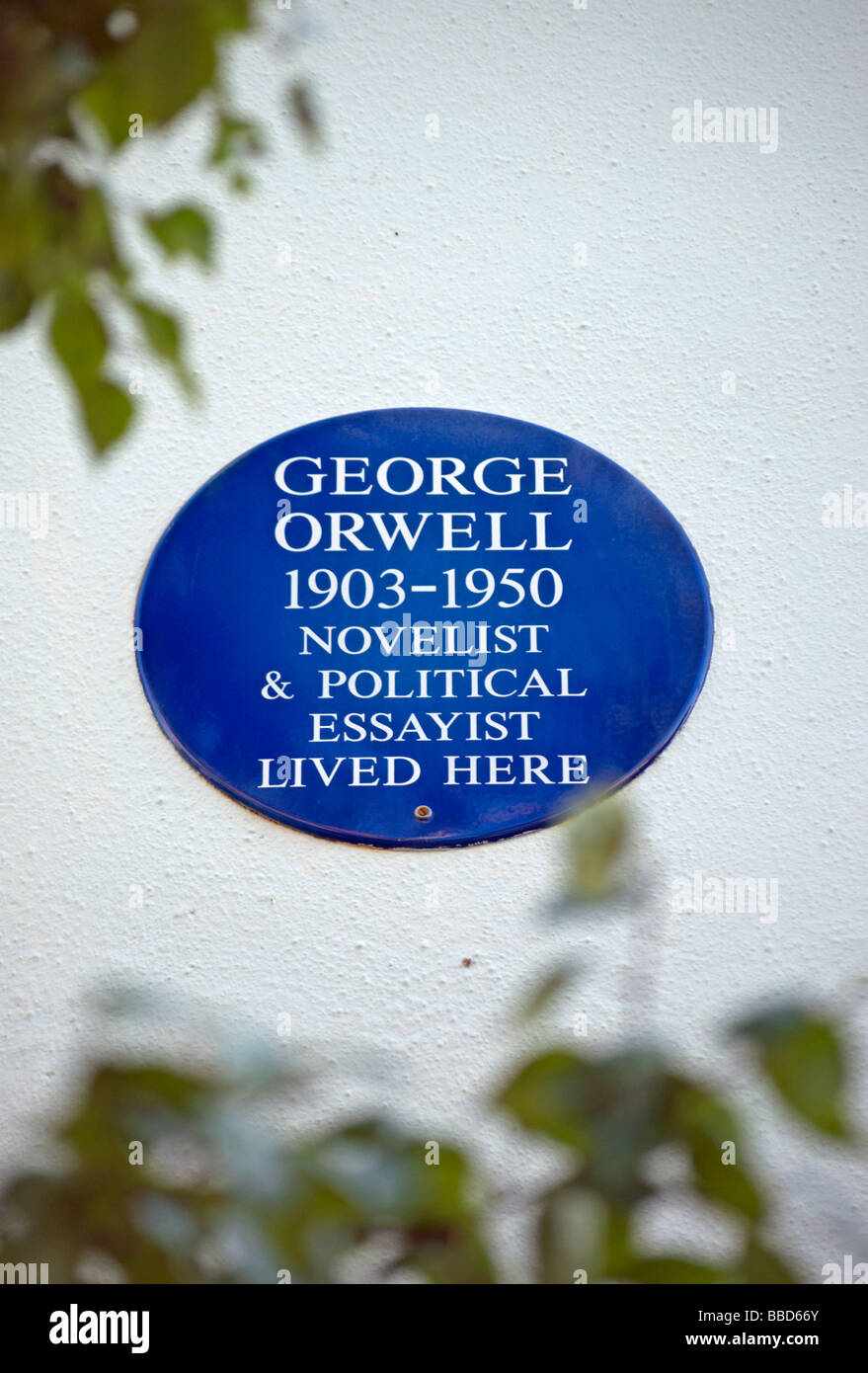 blue plaque marking a former home of novelist and essayist