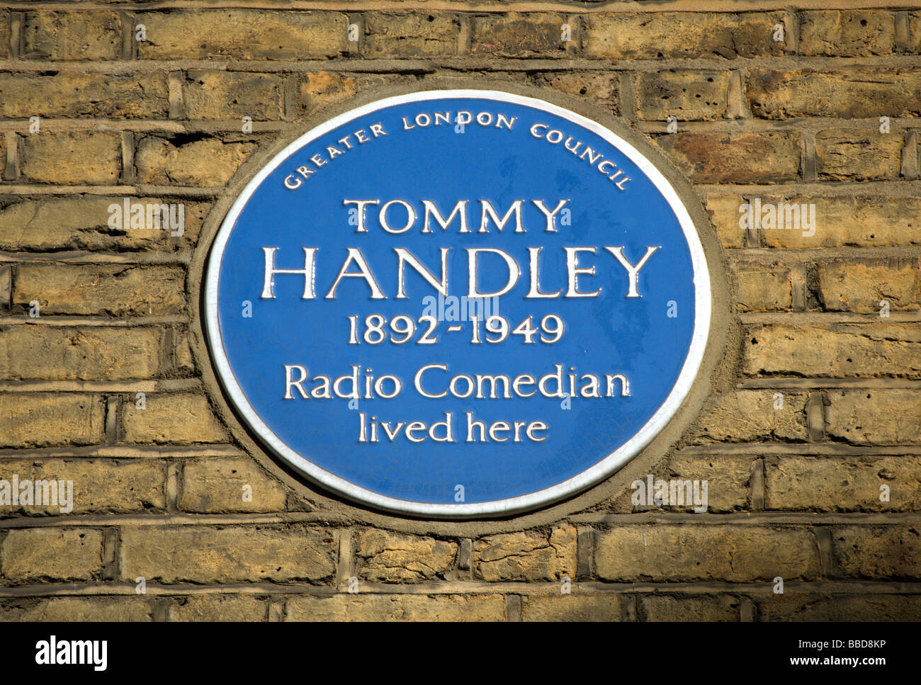 blue plaque marking a former home of radio comedian tommy handley, west london, england Stock Photo