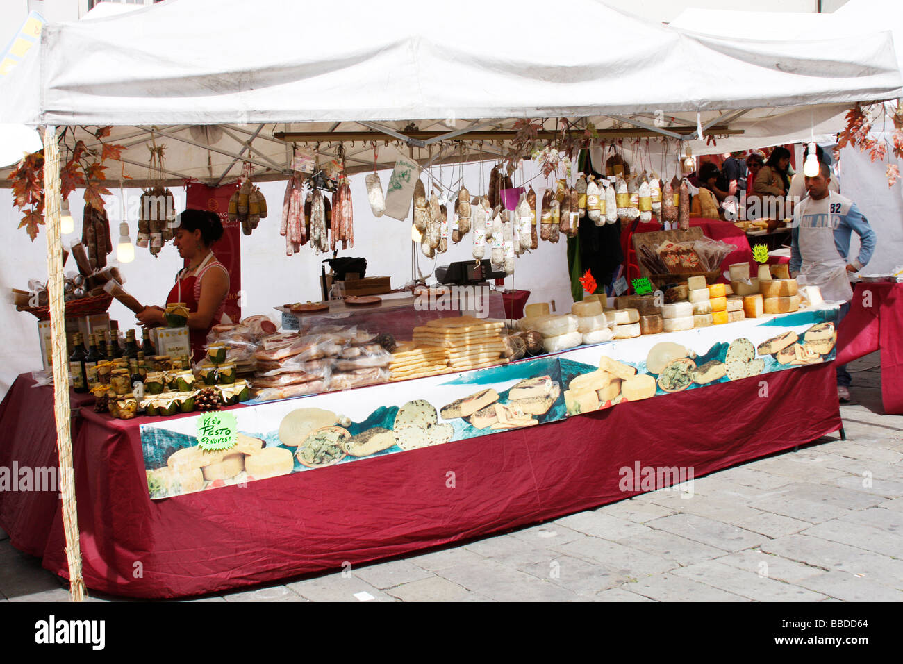 Meat and cheese stall at a weekly market in Genoa,Italy Stock Photo