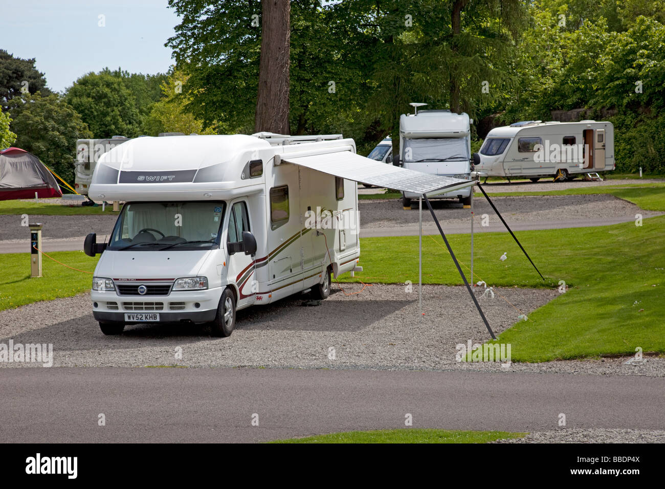 Large modern motorhome with awning on Caravan Club site Tredegar House Newport South Wales UK Stock Photo
