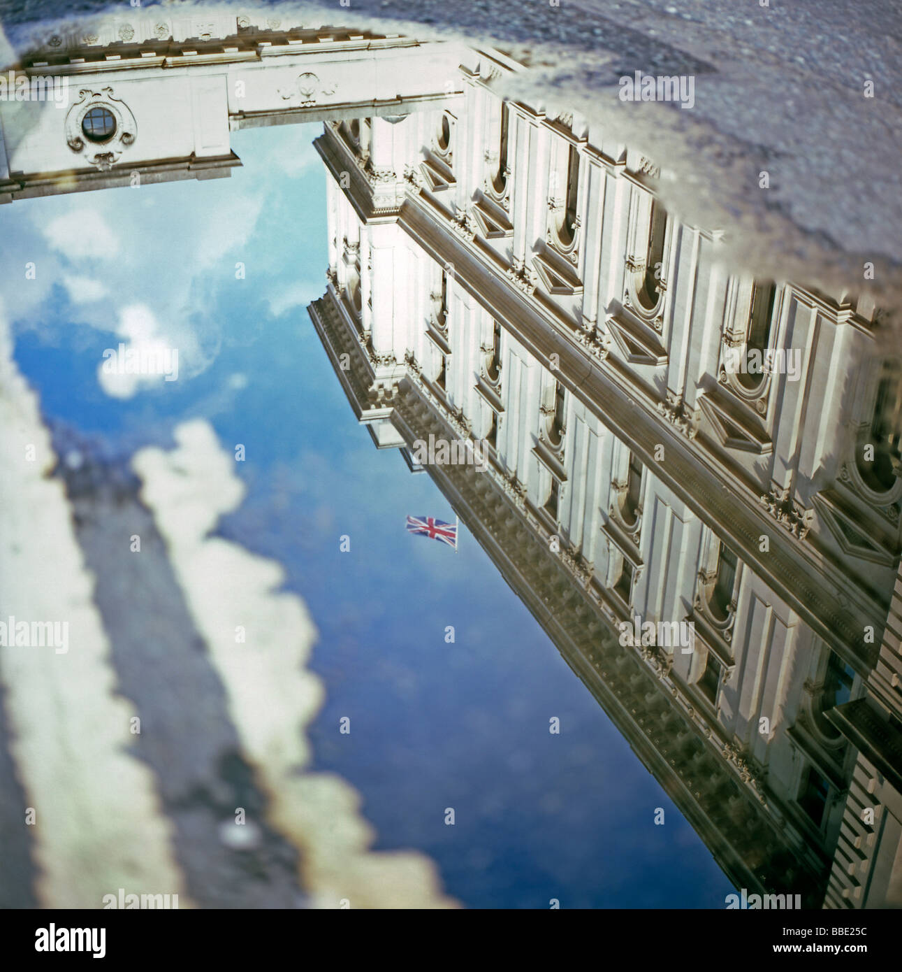 HM Treasury building with Union Jack flag blue sky upside down ...