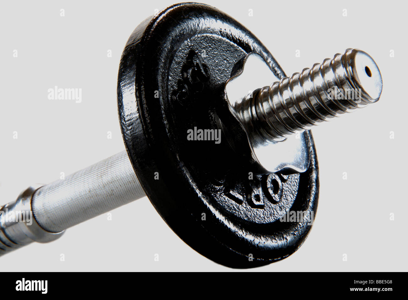Weight disc of a dumbbell Stock Photo