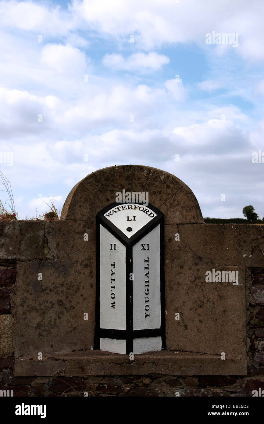 historic road signs giving directions and mileage Stock Photo Alamy