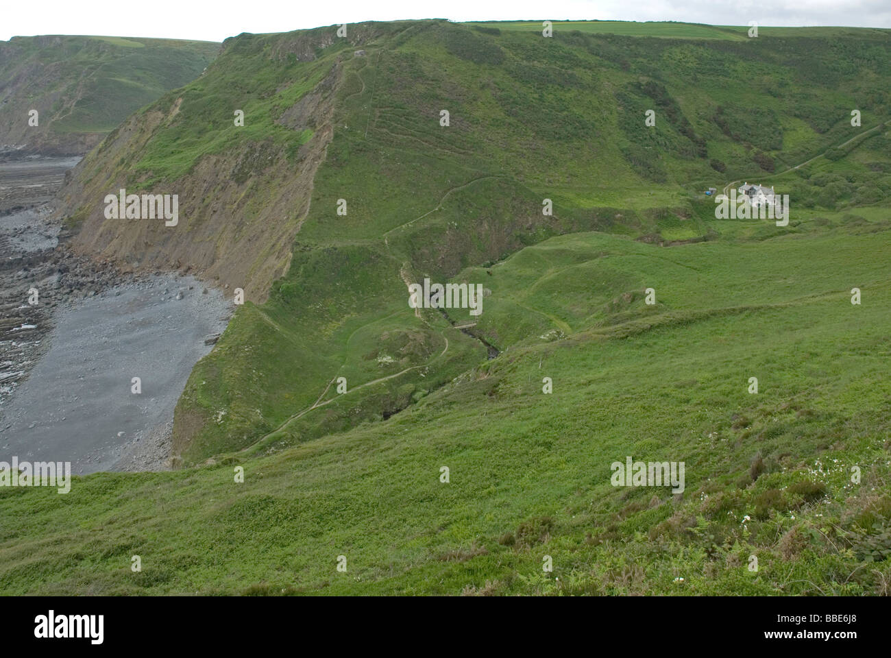 Marsland Mouth and sea cliffs at Marsland Mouth on the Devon Cornwall border Stock Photo