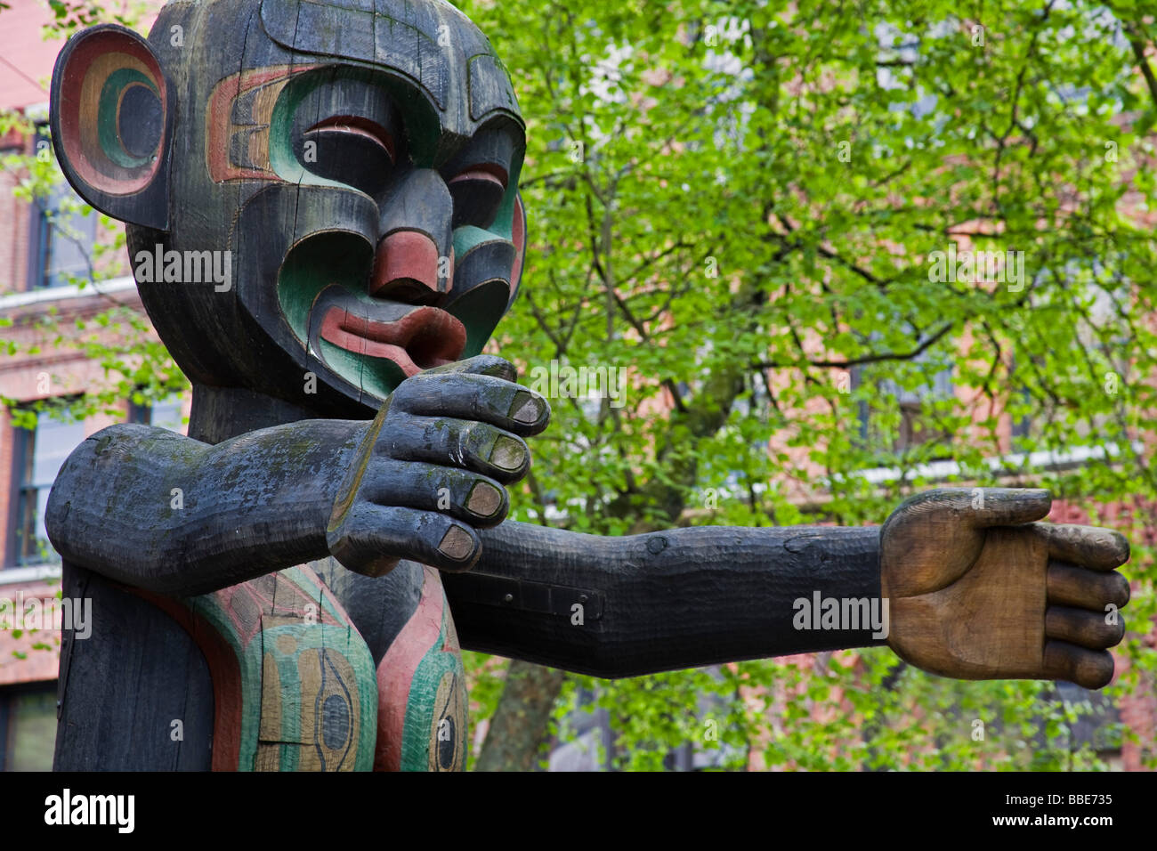 Wooden Statue in Pioneer Square; Seattle, Washington State, USA Stock