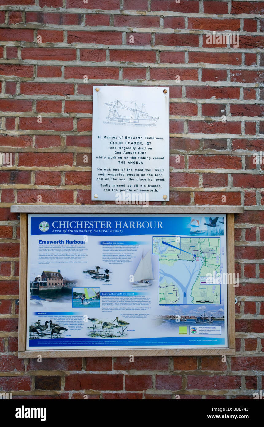 Tourist information map of Emsworth Harbour, plus memorial plaque to an Emsworth Fisherman Colin Loader, Hampshire, UK Stock Photo