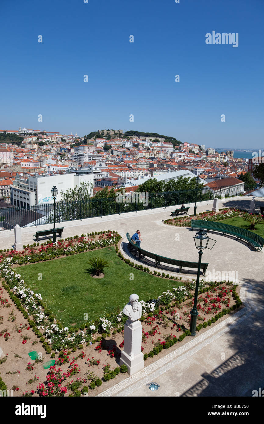 View of the Baixa (Lisbon downtown) and the Sao Jorge Castle from the Miradouro de Sao Pedro de Alcantara (Belvedere). Stock Photo