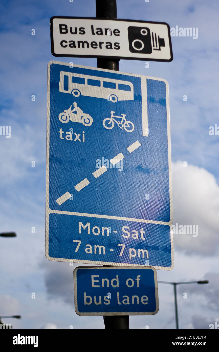 Road side sign indicating bus lane cameras Stock Photo