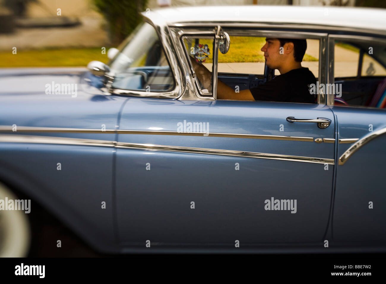 Driving a classic car at the parade Culver City Car Show Culver City Los Angeles County Stock Photo