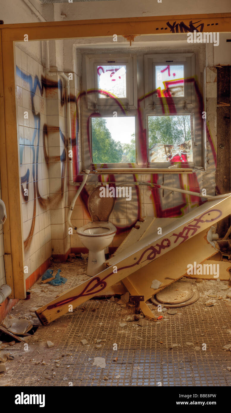 Old toilet room in a ruin Stock Photo