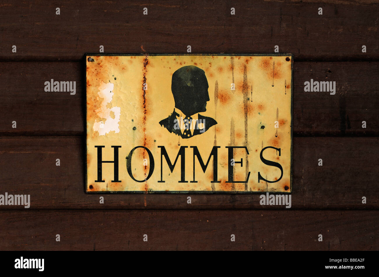 Old French toilet sign 'Hommes', Schoppenwihr, Alsace, France, Europe Stock Photo