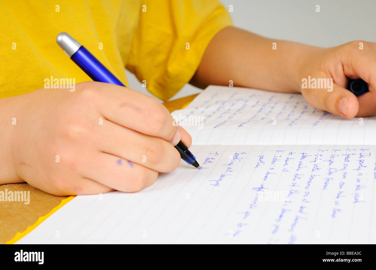 Boy doing his English homework for school Stock Photo