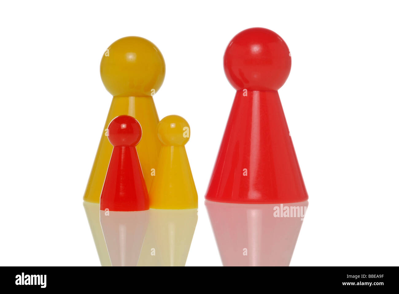 Various game pieces, symbolic for a family Stock Photo Alamy