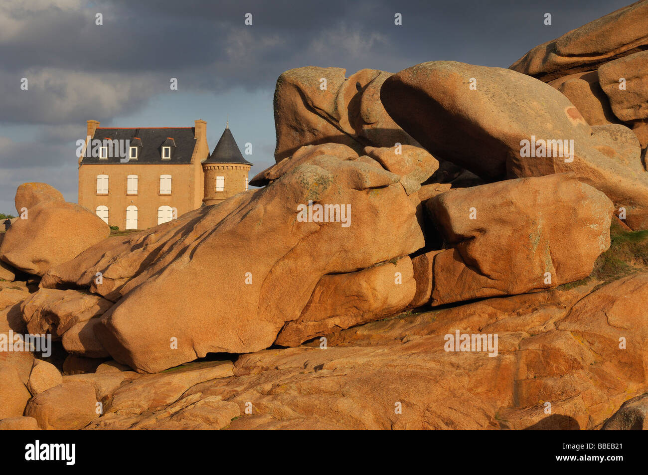 House and Boulders, Cote De Granit Rose, Cotes-d'Armor, Brittany, France Stock Photo