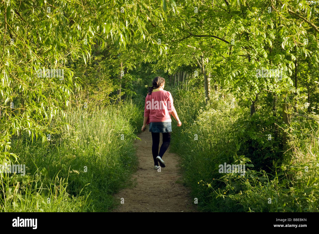 girl walking in the woods