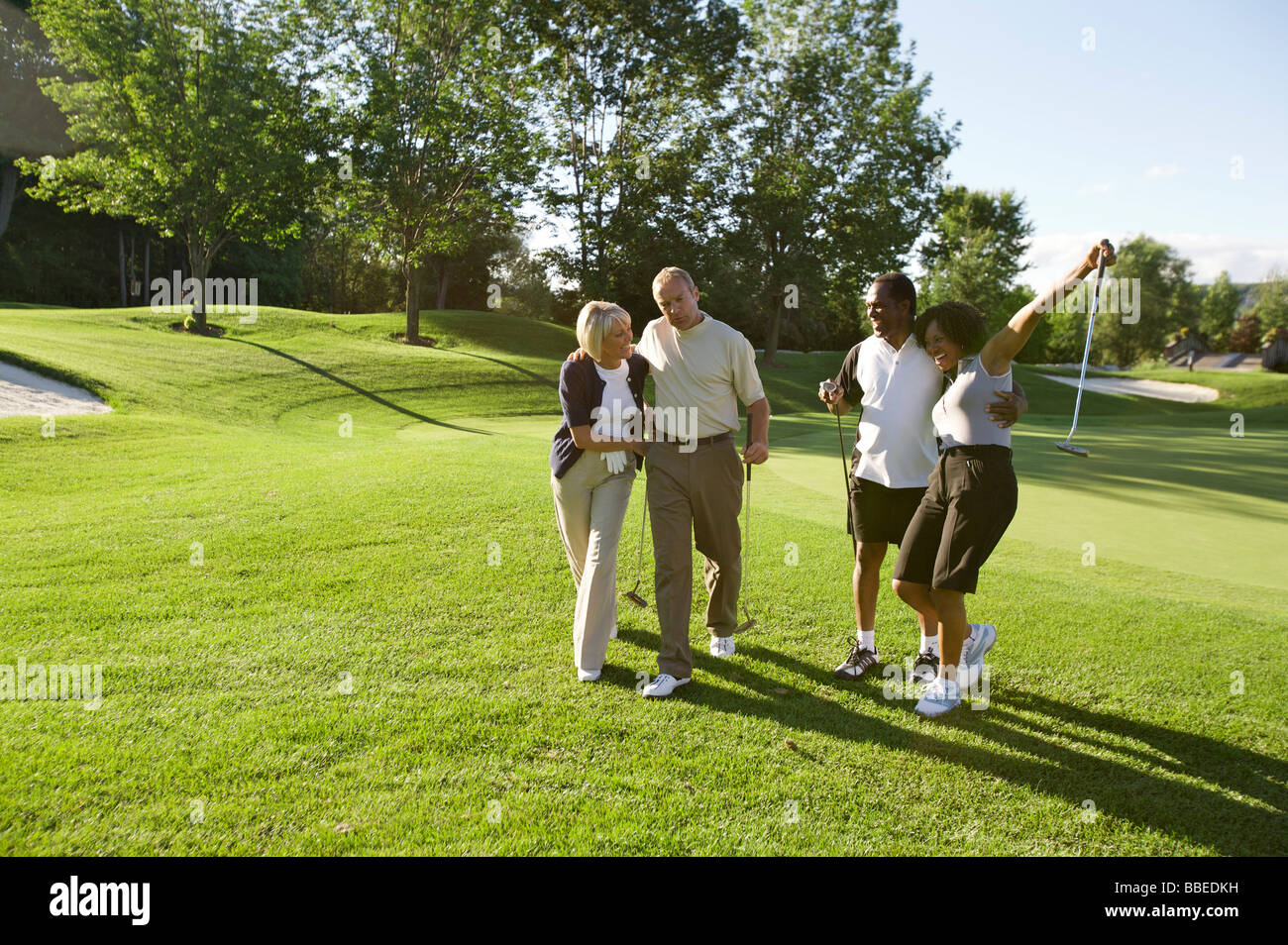 Couples on Golf Course, Burlington, Ontario, Canada Stock Photo