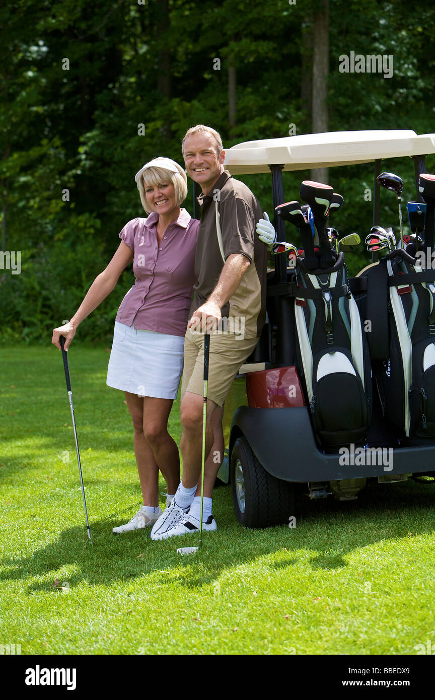 Couple Playing Golf, Burlington, Ontario, Canada Stock Photo
