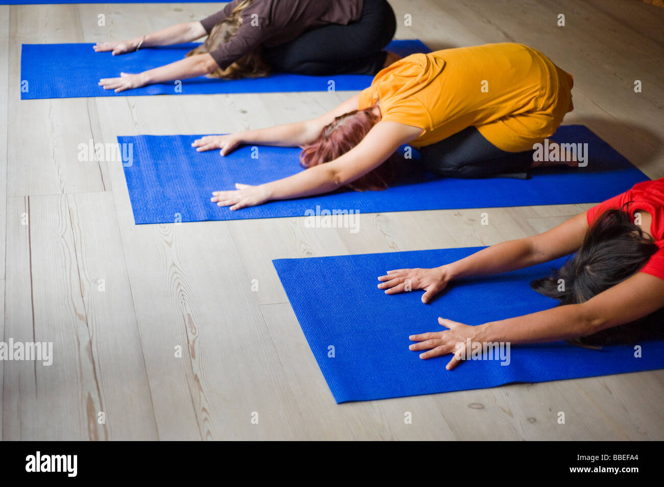 Women in Yoga Class Doing Child Pose Stock Photo Alamy