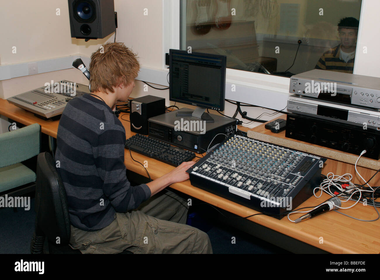 CHILDREN Education Secondary School Students using sound desk in school ...