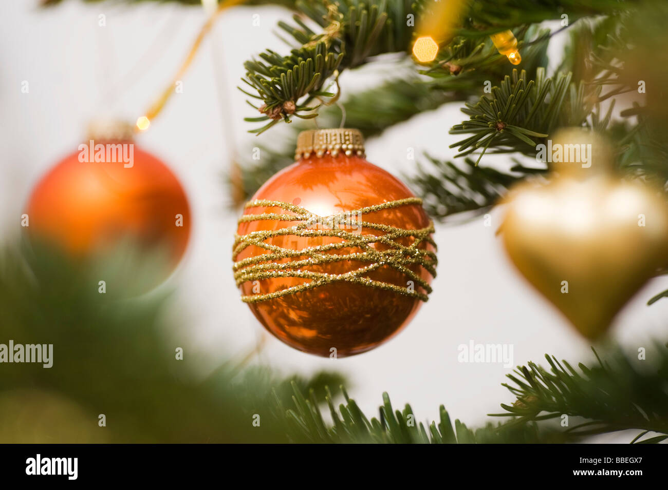 Close-up of Christmas Ornaments on Christmas Tree Stock Photo