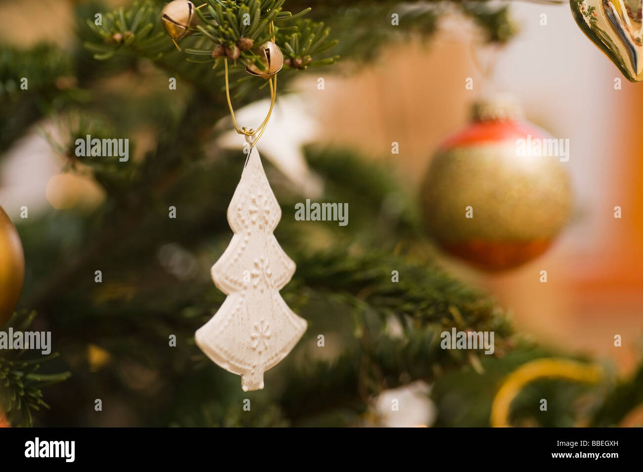 Close-up of Christmas Ornaments on Christmas Tree Stock Photo