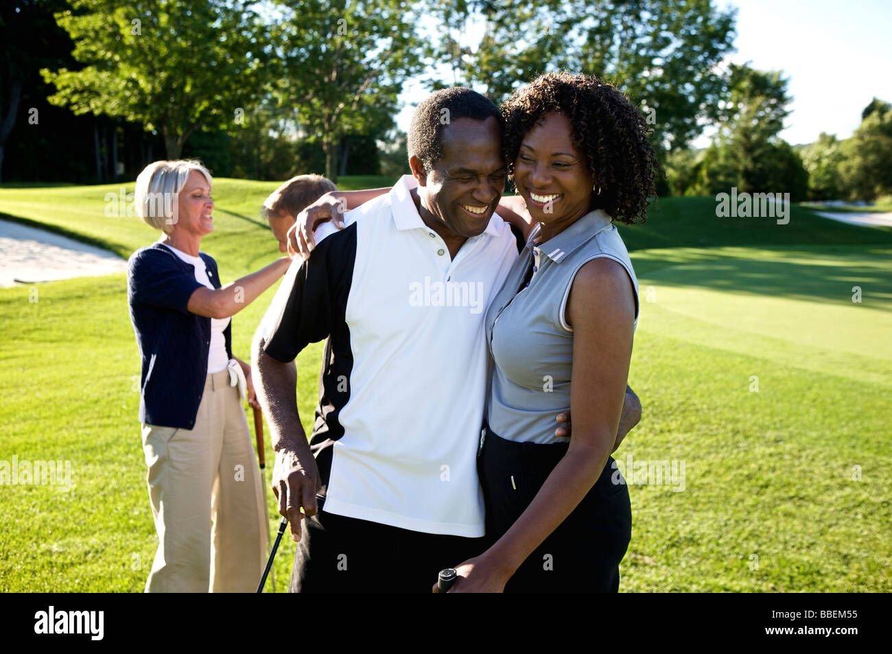 Couples on Golf Course, Burlington, Ontario, Canada Stock Photo