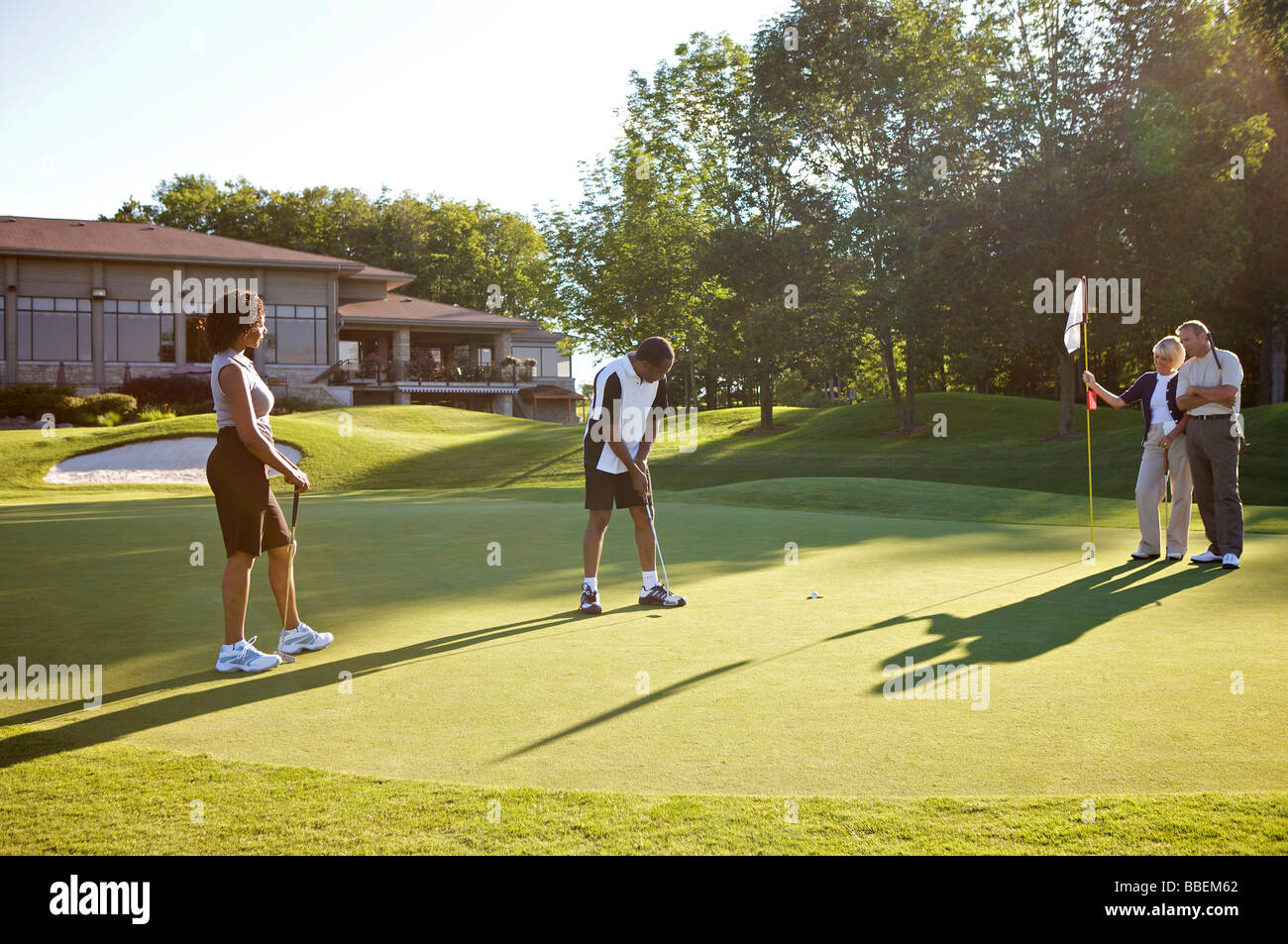 Couples Golfing, Burlington, Ontario, Canada Stock Photo