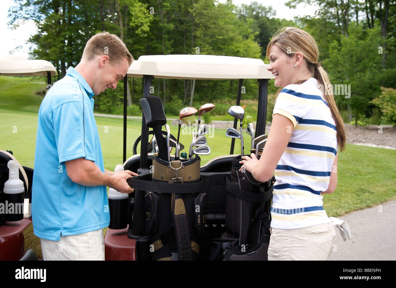 Couple Golfing Stock Photo