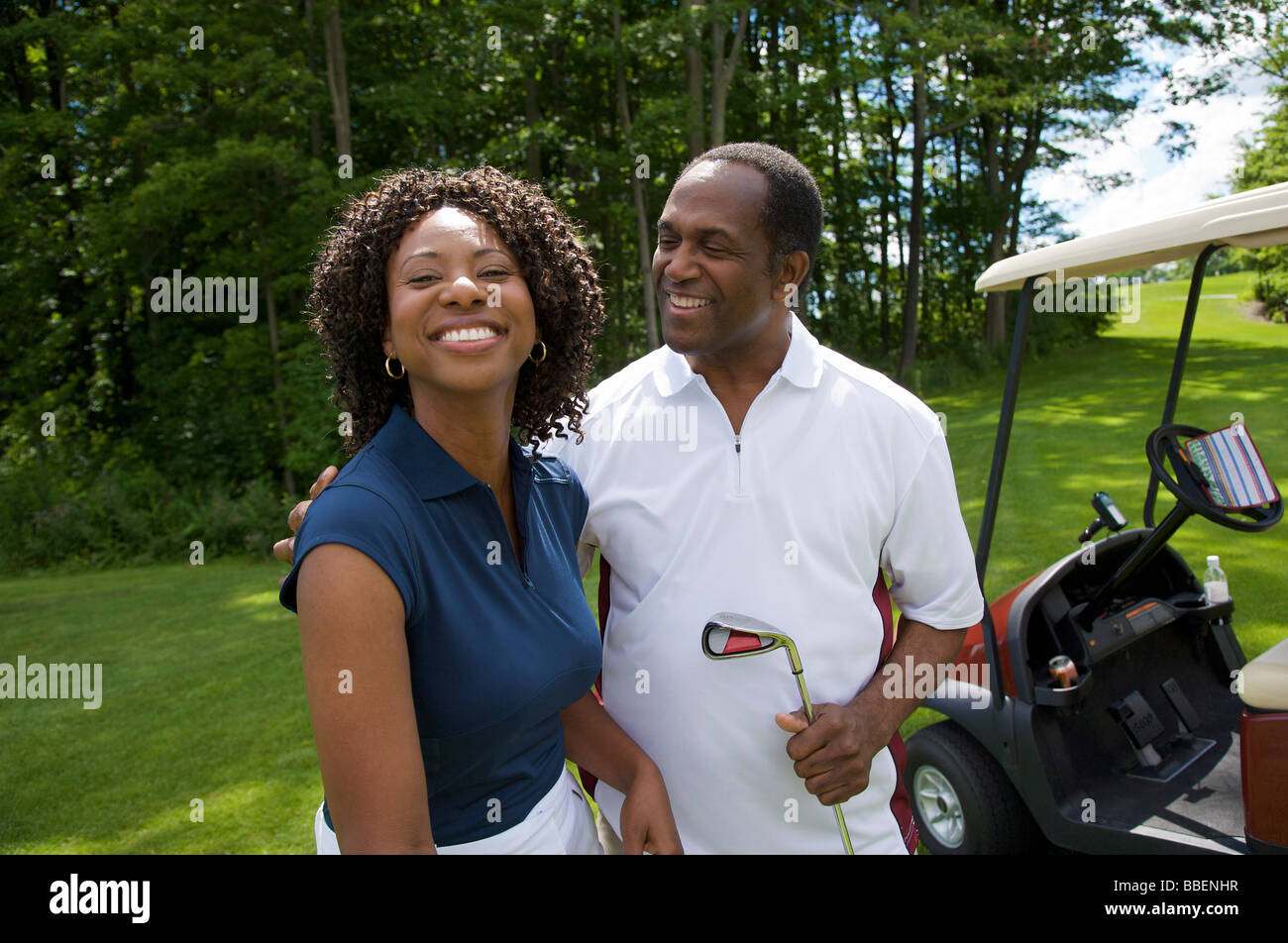 Couple Golfing Stock Photo