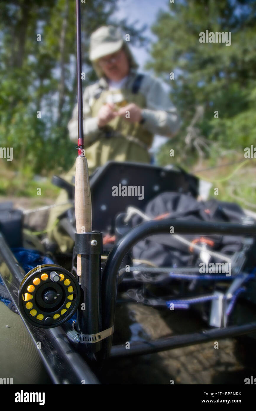 Fly fishing with a pontoon boat on Elk River, British Columbia Stock