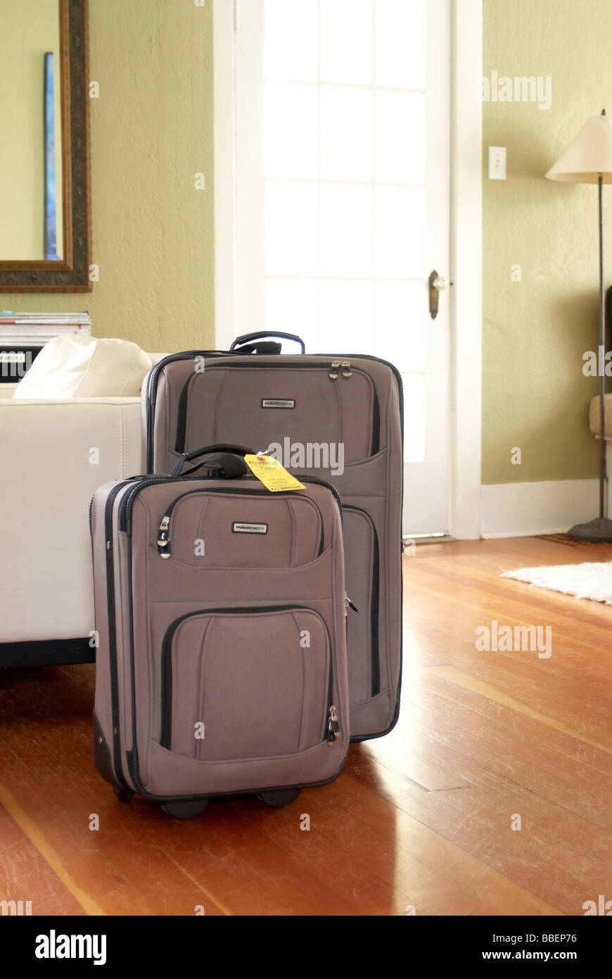 Luggage in front of a door, Victoria, BC Stock Photo Alamy