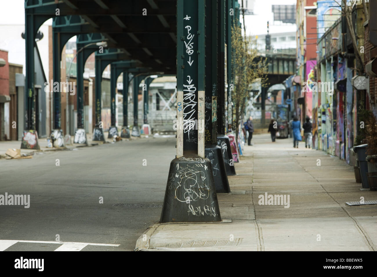 Graffiti on support column of elevated road Stock Photo