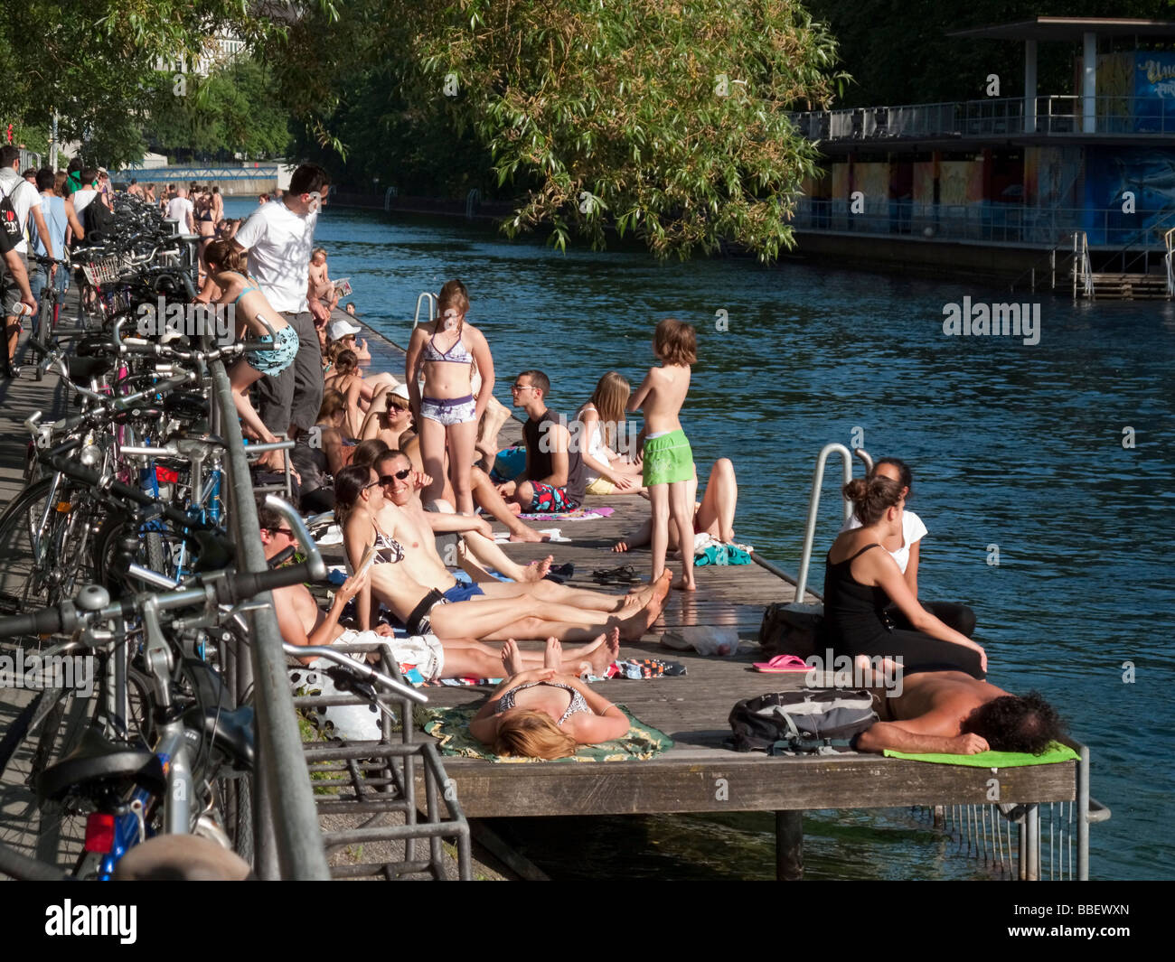 Open air bath Letten at river Limmat people sunbathing Zurich Switzerland Stock Photo