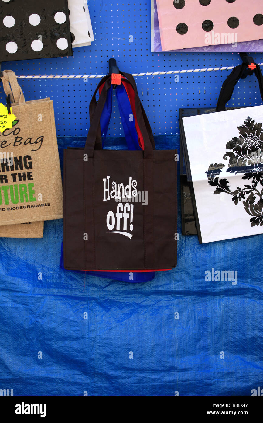 Shopping bags for sale on a market stall Stock Photo