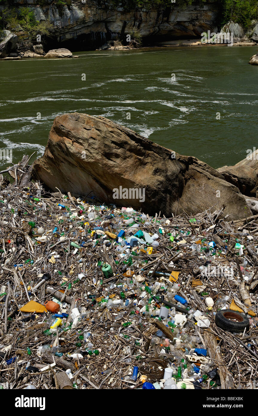Accumulation of Trash and Litter Washed Up on the Shore of the Cumberland River in McCreary County Kentucky Stock Photo