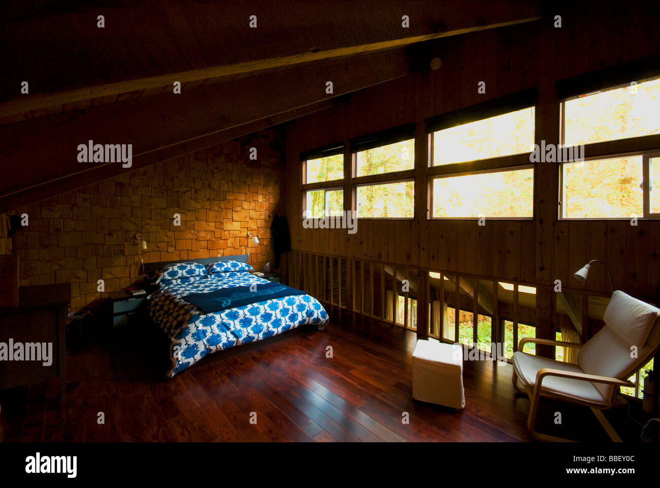 The loft bedroom of a cabin Stock Photo