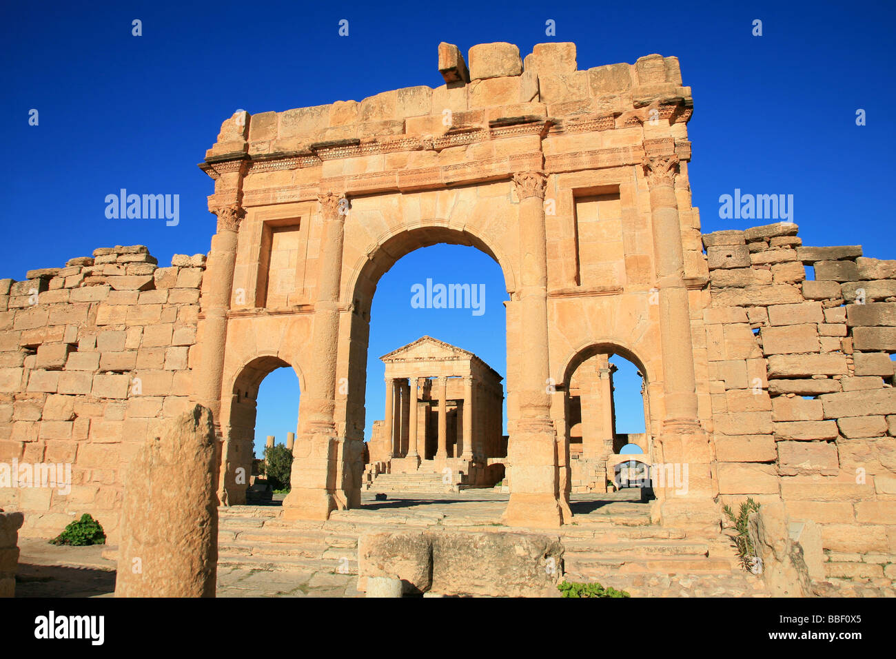 view-through-the-antonine-gate-at-the-temple-of-minerva-at-the-grand