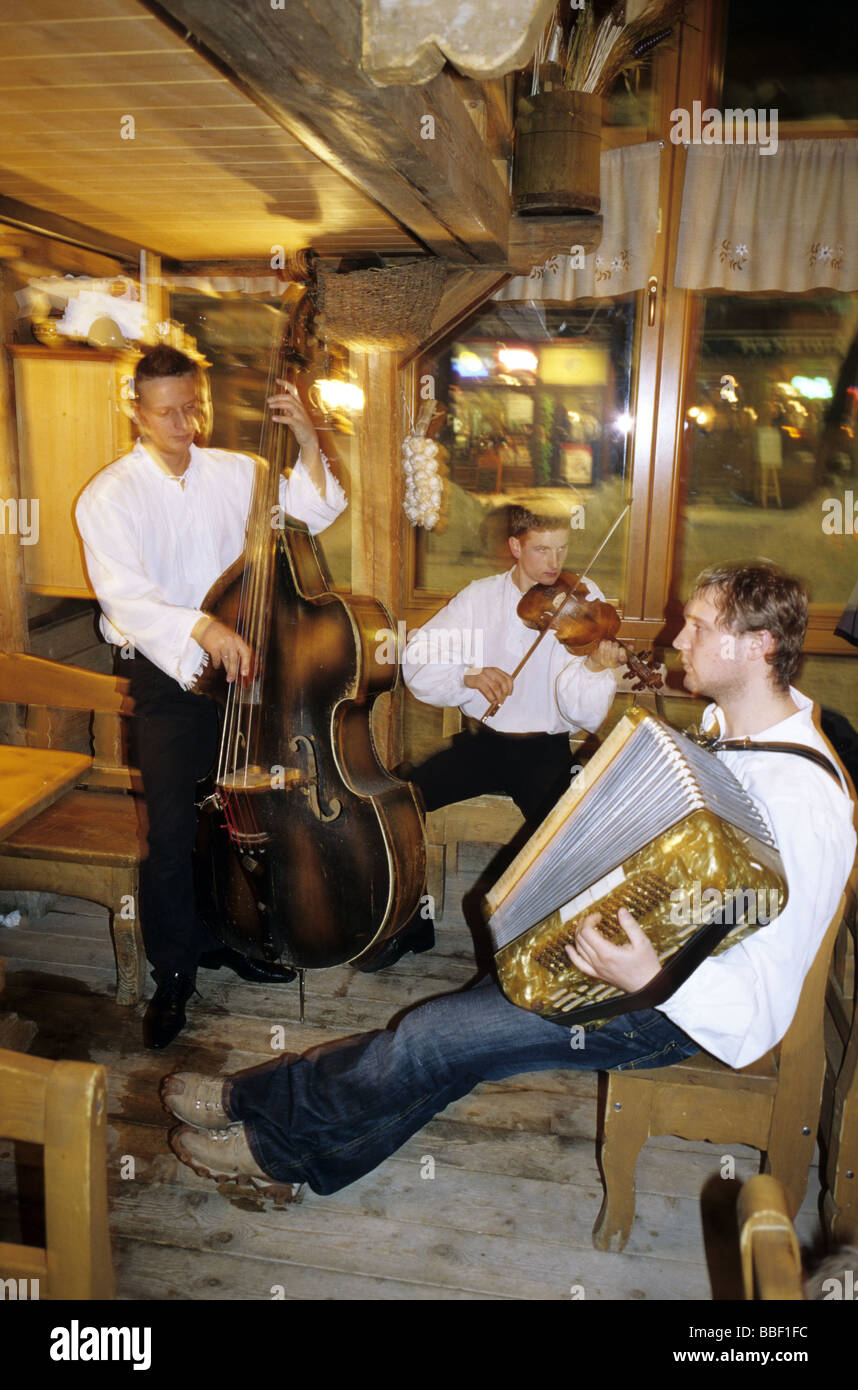 Poland Zakopane mountaineers tradition band playing in a restaurant on Krupowki street Stock Photo