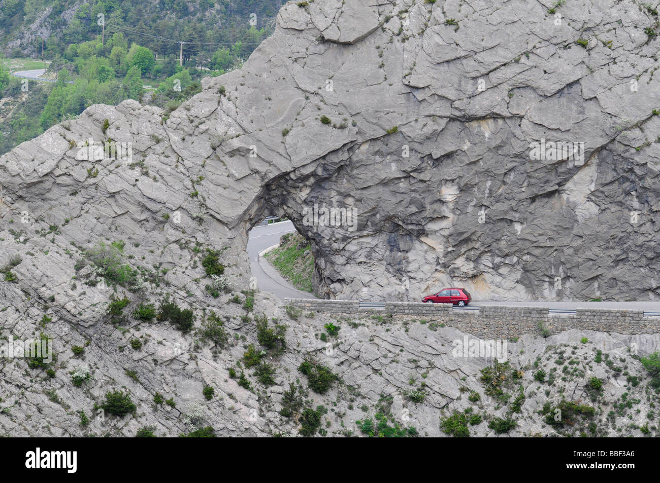 Driving a car on the famous 'route Napoleon', a winding scenic road in a canyon in southern France. Stock Photo