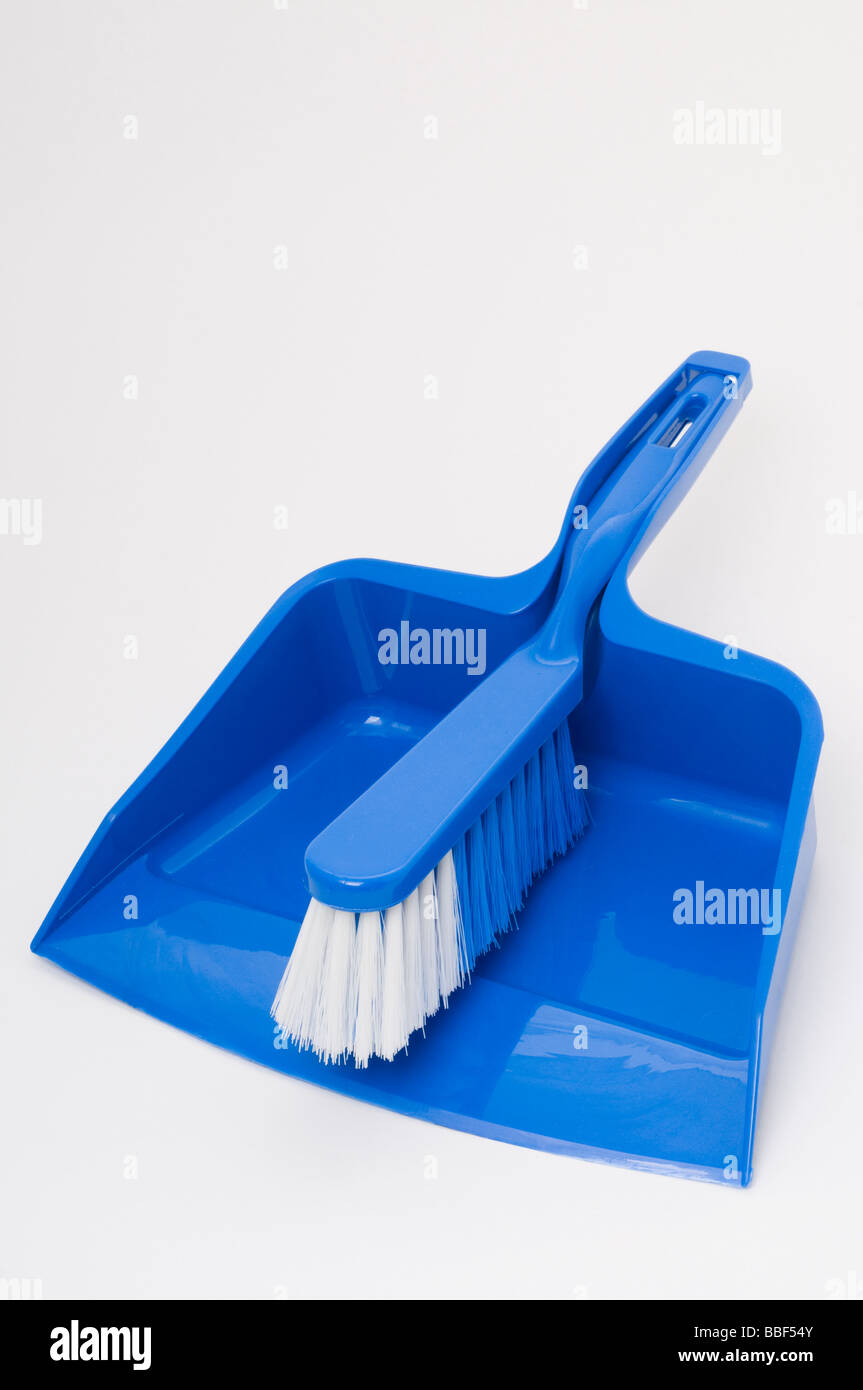 A blue dust pan and brush Stock Photo