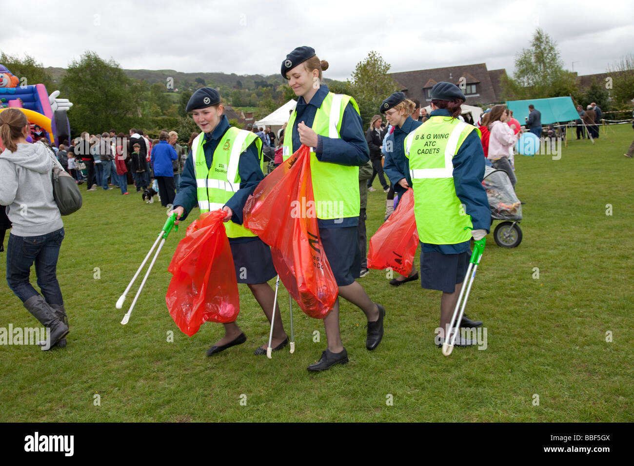 Air cadets girls picking up litter May Day fair Woodmancote Cheltenham
