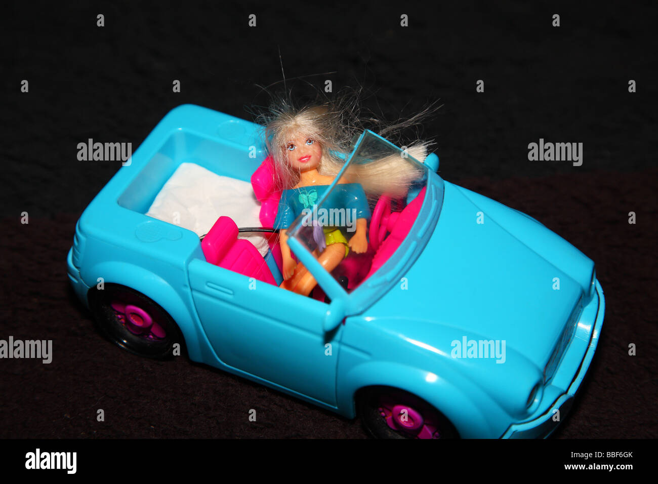 Blue Toy Car on dark background Stock Photo