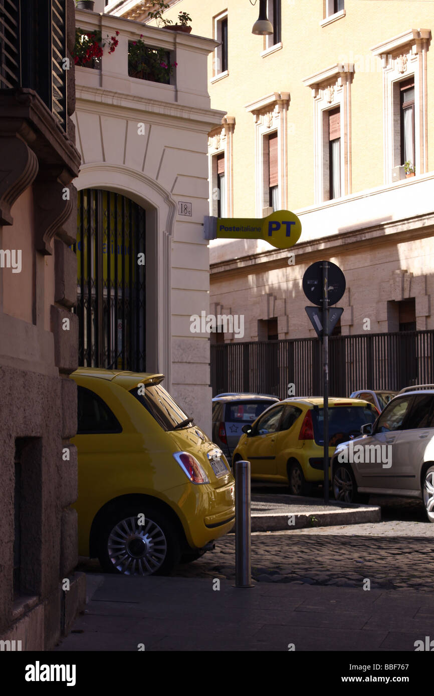 Yellow Fiat 500 parked in a street of Rome Stock Photo - Alamy