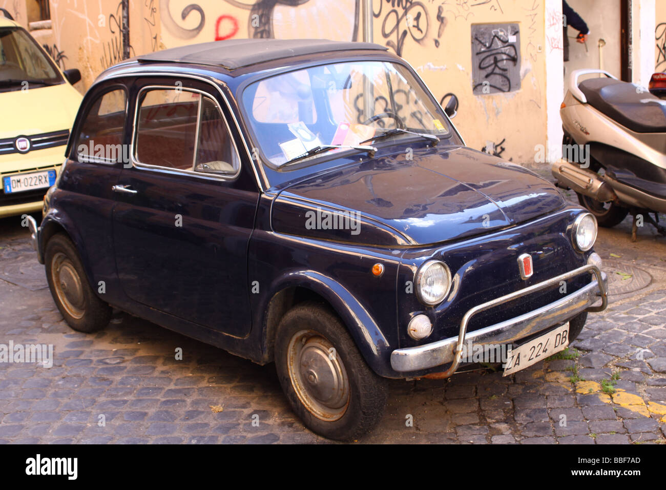 Old blue Fiat 500 parked Stock Photo