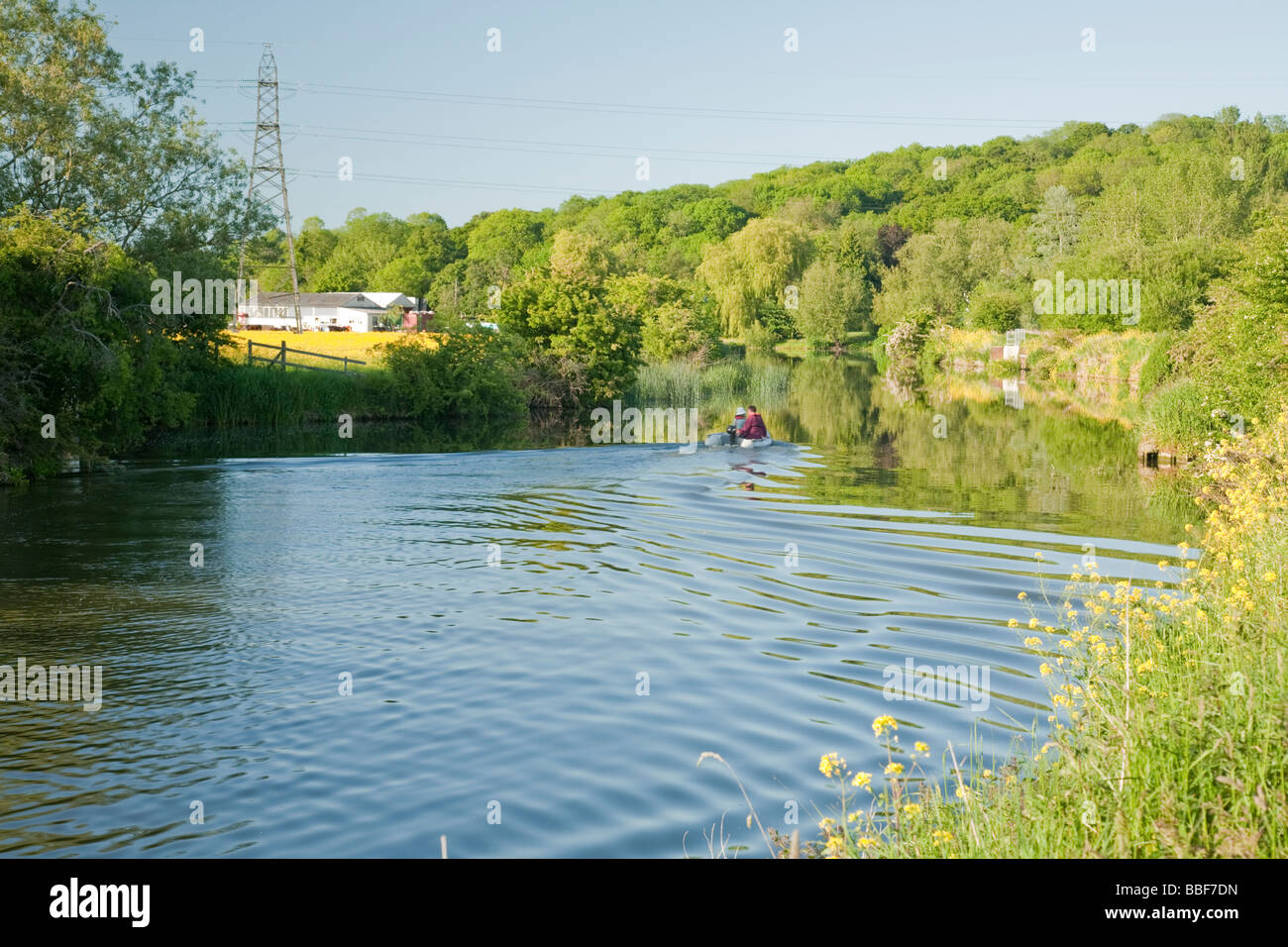 Small boat on the River Thames downstream from Pinkhill Lock near Oxford Uk Stock Photo