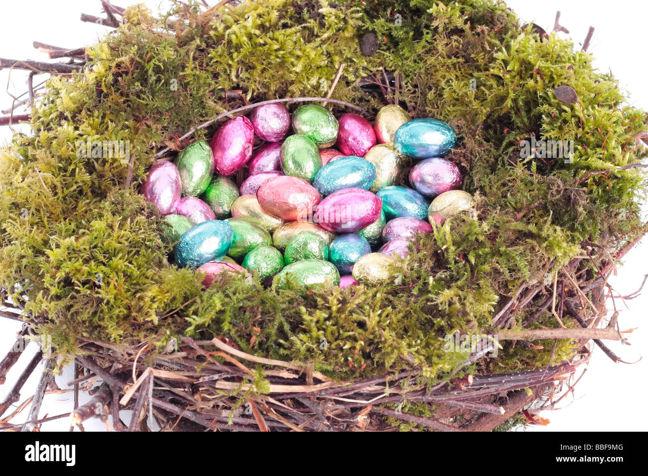 Easter eggs in bird nest closeup Stock Photo - Alamy