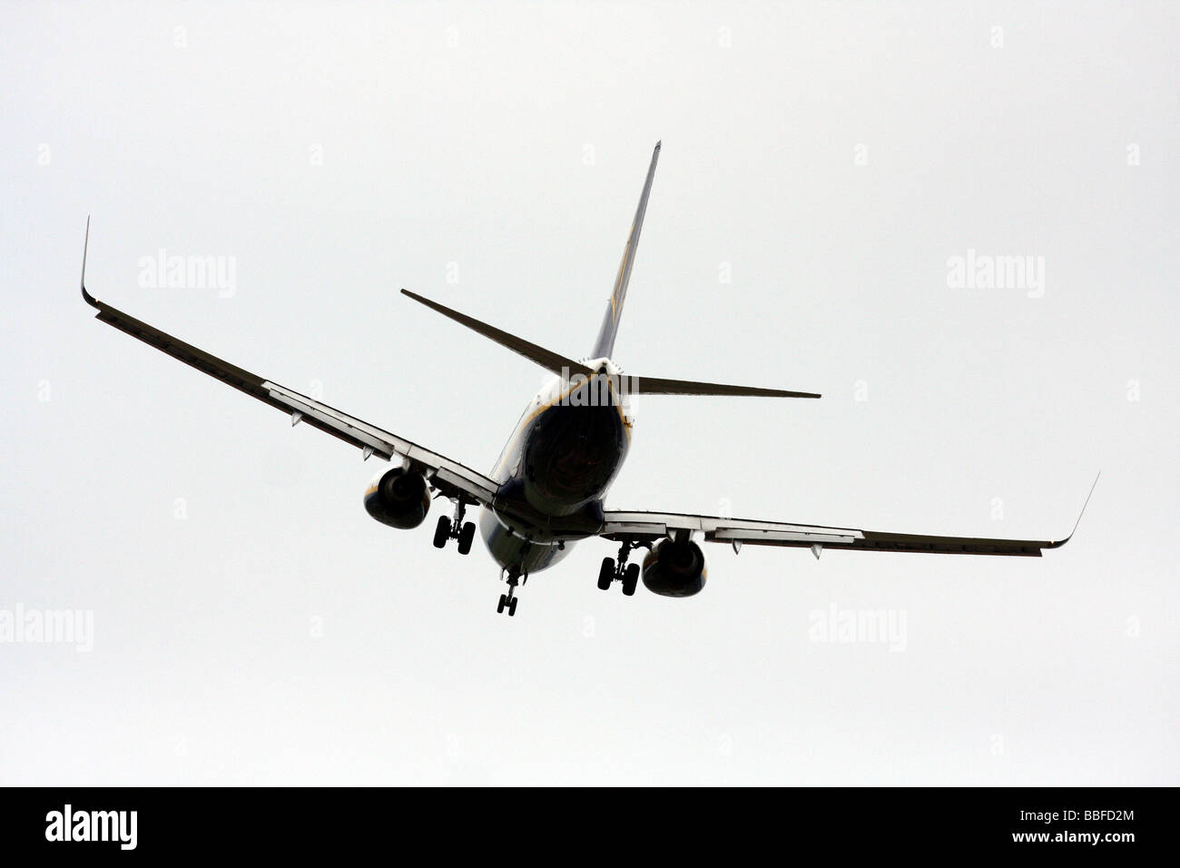 airline passenger jet aircraft coming into land at a UK airport Stock Photo